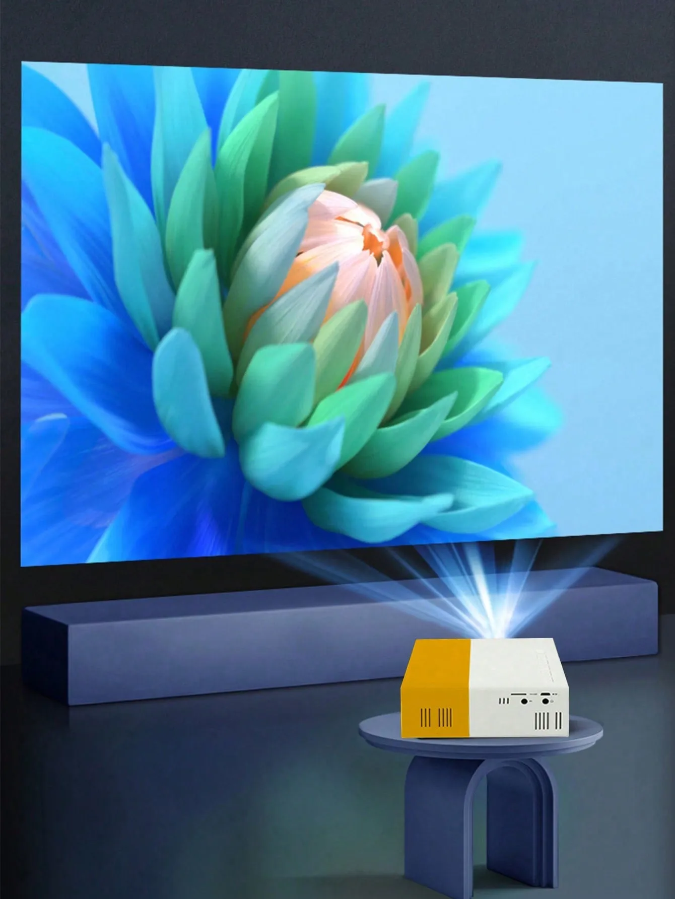 Portable mini projector with built-in speaker