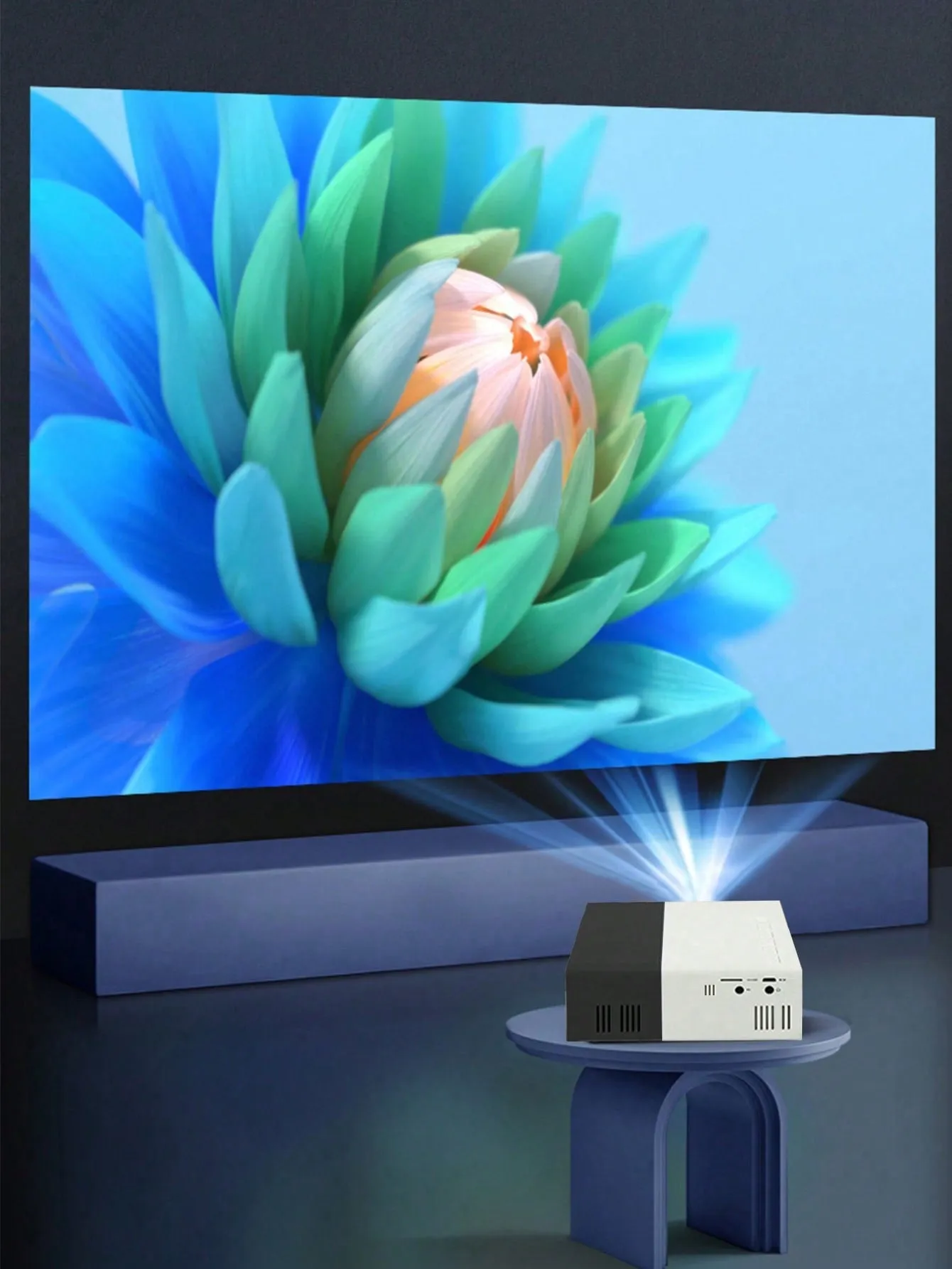 Portable mini projector with built-in speaker